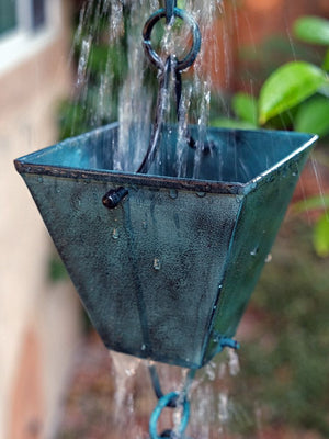 Extra Large Square Cups Rain Chain in Patina with rainwater running through cup