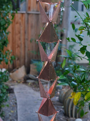Origami™ Rain Chain in copper plated stainless steel with water running through cups