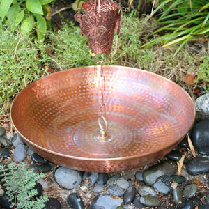 This is a close up photo of our hand hammered copper dish with a loop kit attached to our Dragonfly Rain Chain. Click on the image to shop all of our rain chain accessories. 