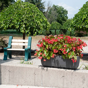 30 inch rectangular garden planter in graphite with red and green flowers