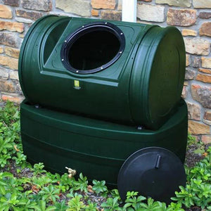 Compost Wizard Hybrid in green color being used in yard