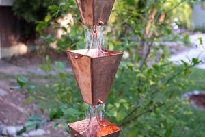 Large Tapered Cup style rain chain in Copper with water running through cups