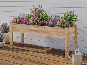 Elevated Cedar Planter (23" x 72" x 30") with flowers on a deck