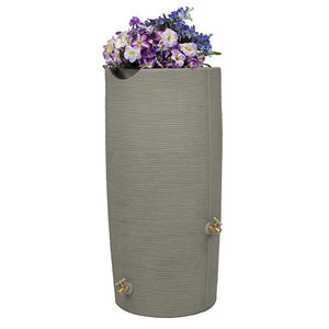 Impressions Stone 50 Gallon Rain Saver in Sandstone with flowers in top