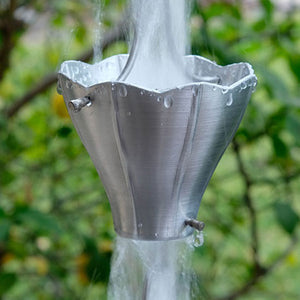 Star Flower Cups Rain Chain in aluminum with water flowing through cup