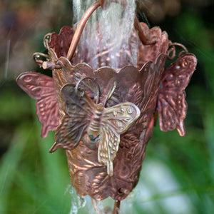 Butterfly Theme Copper Rain Chain with water flowing through cup