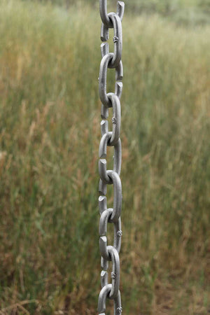Longer length view of Cast Oval Links Rain Chain in Aluminum