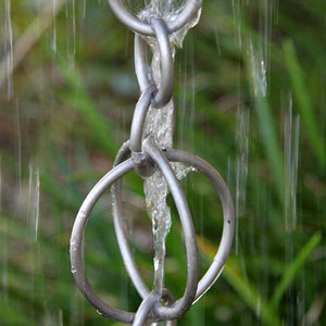 Stainless steel Circles Link Rain Chain with water flowing through it