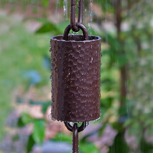 Close up of Kenchiku Rain Chain in Bronze cylinder