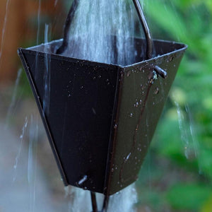 Tapered Square Cups Rain Chain with water flowing through cup