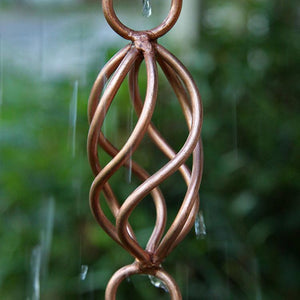 close up view of twist loops copper rain chain