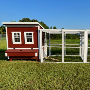 8 foot wooden chicken run in white attached to a red OverEZ Chicken Coop