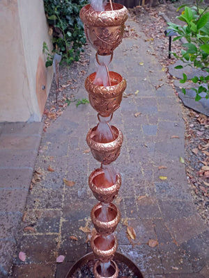 Autumn Oak Rain Chain in heavy rain