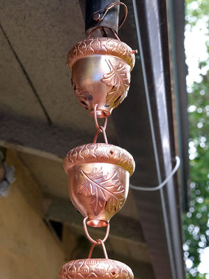 Autumn Oak Rain Chain hanging on homes gutter