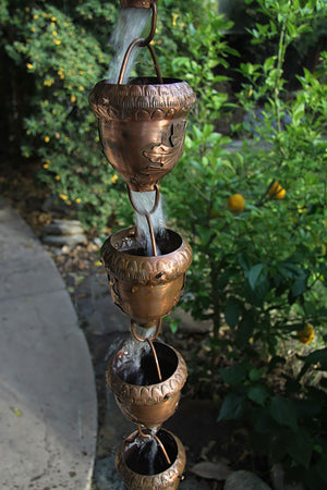 Autumn Oak Rain Chain with water running through cups