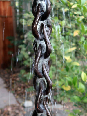 Bronze Cast Aluminum Droplet Rain Chain in Rain Storm
