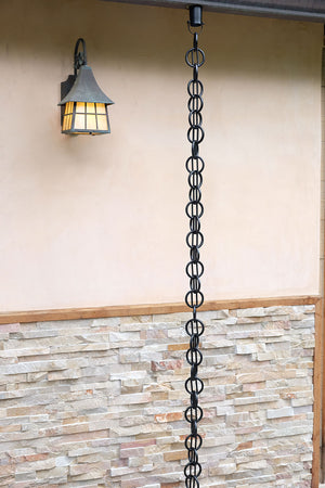 Cast Zen Loops Rain Chain Black hangin on gutter