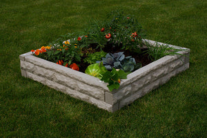 Garden Wizard Raised Bed Garden Sandstone in a yard