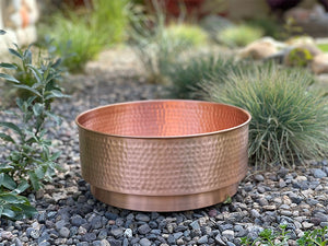 Hammered Copper Cylinder Basin in landscaping