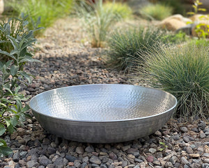 Hand Hammered Aluminum Dish in landscaping