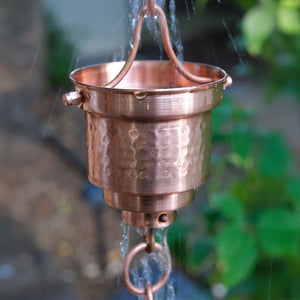Copper Naoki Cups Rain Chain with water flowing through cup