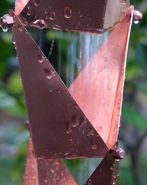 Close up view of Origami™ Rain Chain in copper plated stainless steel
