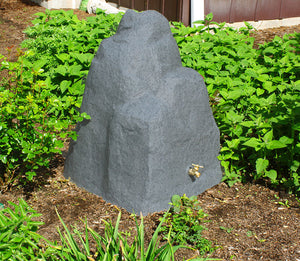 Rain Wizard Rock 42 Gallon Rain Saver in landscaping