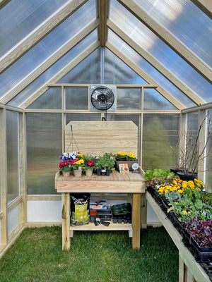 Inside of Amish Greenhouse with workbench and potting table