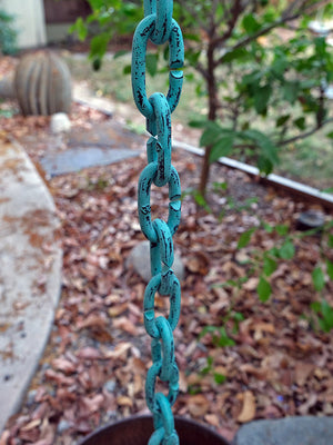 longer length view of Cast Oval Links Rain Chain in Patina finish