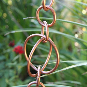 This is a close up photo our Circles Link Rain Chain with Copper Plating. A very popular link style rain chain. Click this image to shop all of our link style rain chains.