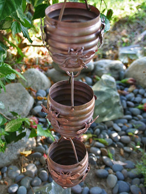 Honeybee & Hive Copper Rain Chain hanging on home