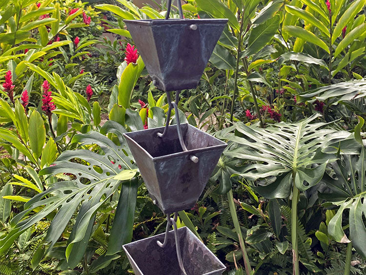 Medium Square Cups Rain Chain in copper that has patinaed over time