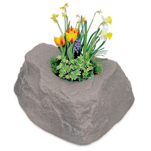 Planter Faux Rock 132 with flowers planted