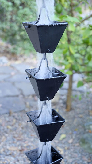 Medium Square Cups Black Rain Chain with water flowing through multiple cups