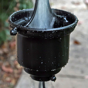 Black Naoki Cups Rain Chain with water flowing through cup