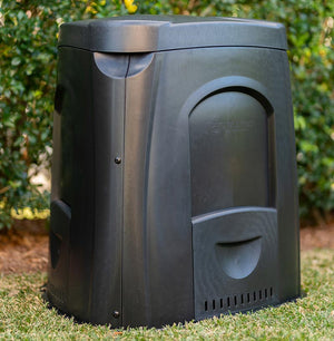 63 gallon compost bin from Tumbleweed in a yard