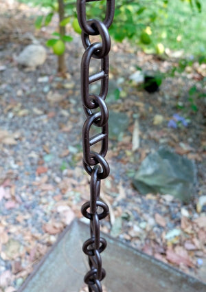 Multiple links of Bronze Aluminum Anchor Rain Chain