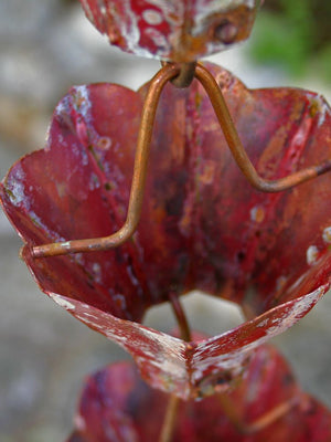 Closeup of Aged Star Flower Cups aged copper Rain Chain