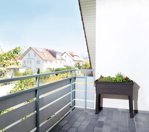 Balcony Raised Bed Planter on a balcony in an urban neighborhood