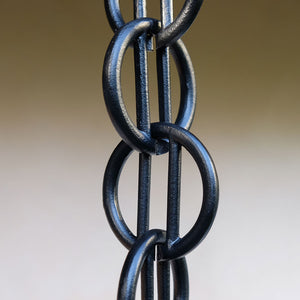 Close up of black Cast Zen Loops Rain Chain