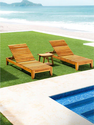 Fortuna Teak Chaise Lounge around tropical pool
