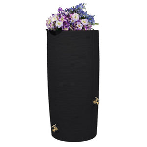Impressions Stone 50 Gallon Rain Saver in Black with flowers in top