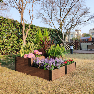 Corner & Terraced Raised Garden Bed Set B in backyard