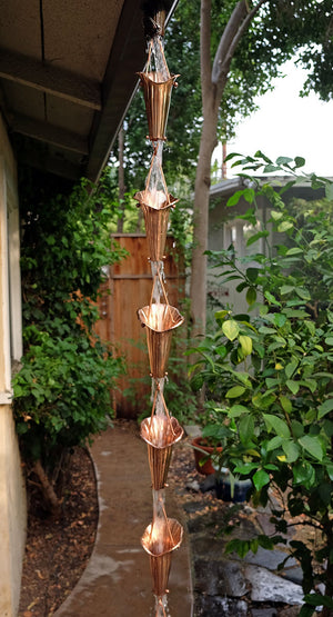 Cala Lily Cups Rain Chain hanging from gutter