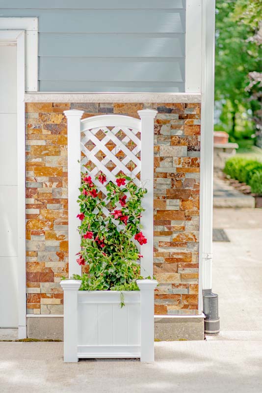 brick planter box against house Kensington Planter with Trellis | Plastic Planter