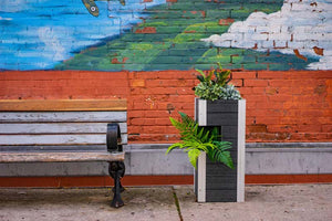 Urbana Pillar Planter next to outdoor bench
