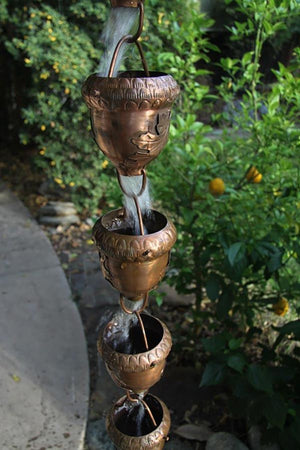 Autumn Oak Copper Rain Chain with water flowing through multiple cups