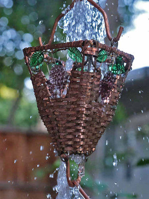 Grape Basket & Glass Cups Rain Chain made with glass and copper in sunlight