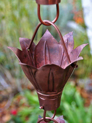 Close up of Bluebell Cups Copper Rain Chain in pure unfinished copper