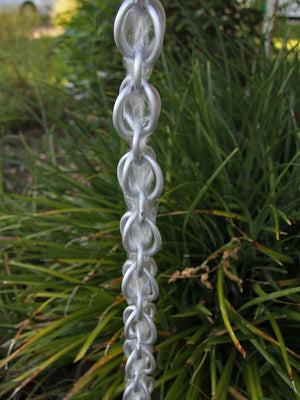 Aluminum double loops with water flowing down rain chain